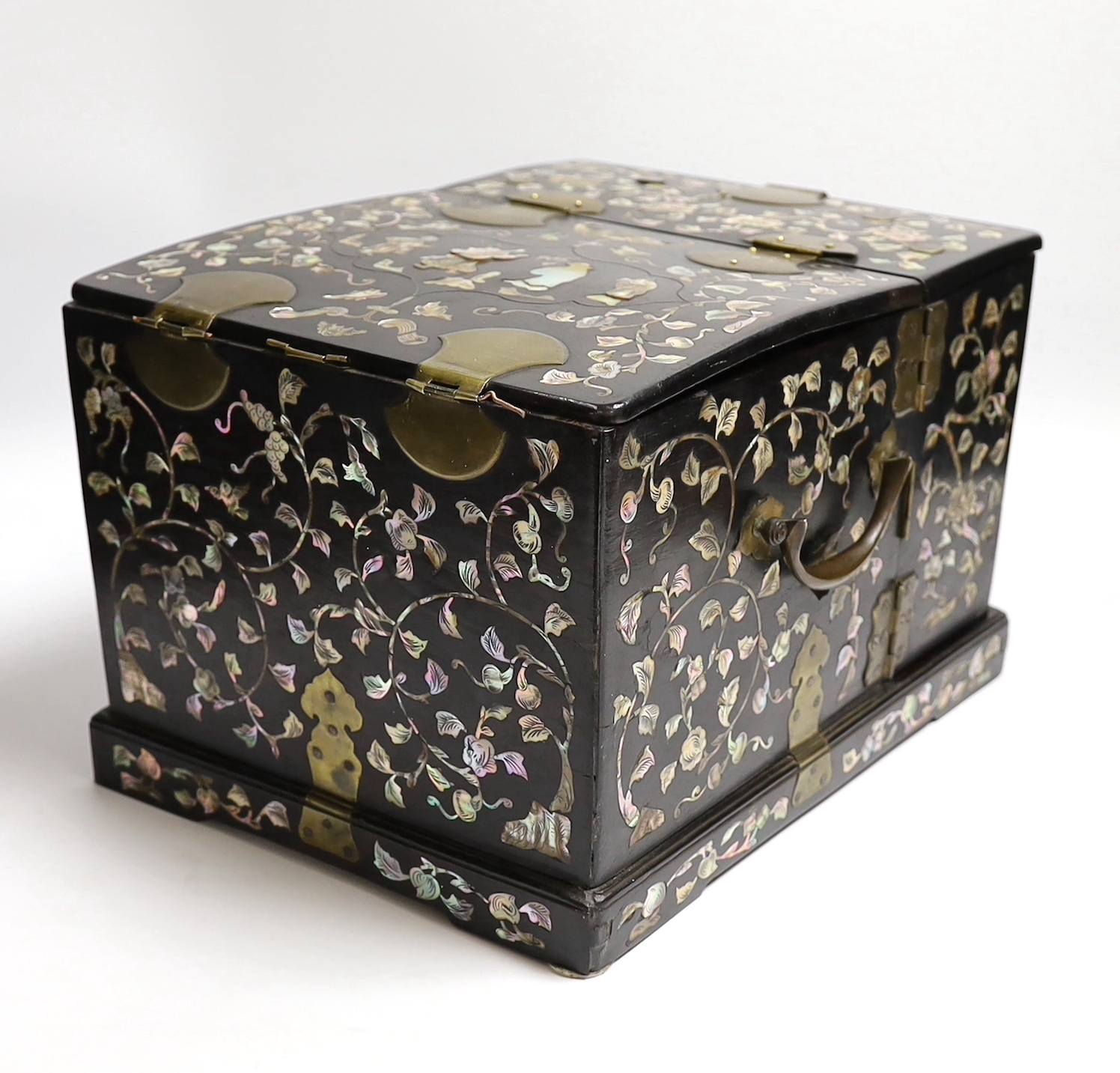 A Chinese mother-of- pearl inlaid hongmu vanity cabinet, late Qing dynasty, with fitted interior comprising a mirror, drawers, etc. 24cm x 31cm x 20cm